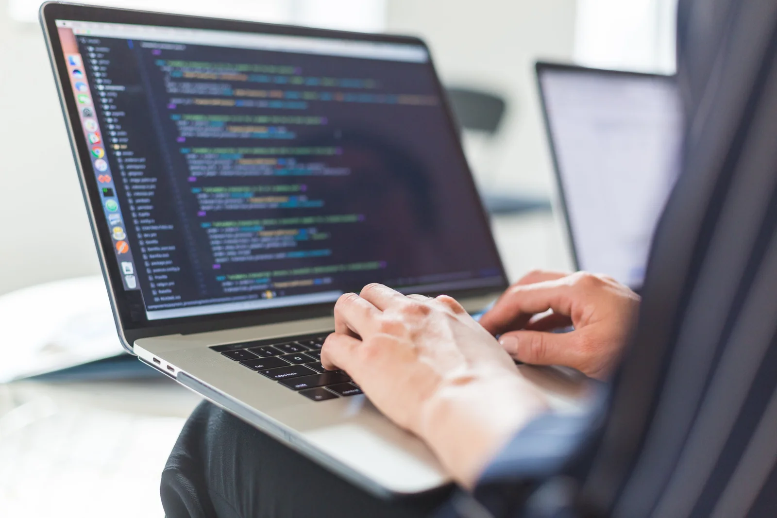 Professional coding on a laptop